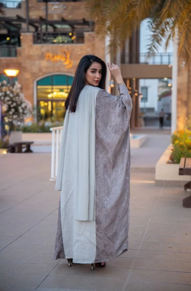 Abaya made of crepe jacquard and linen with embroidery C:IB313